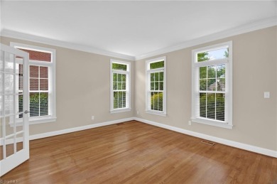 PRICE IMPROVEMENT to reflect cosmetic updates needed. GET INTO on Sedgefield Golf Course in North Carolina - for sale on GolfHomes.com, golf home, golf lot