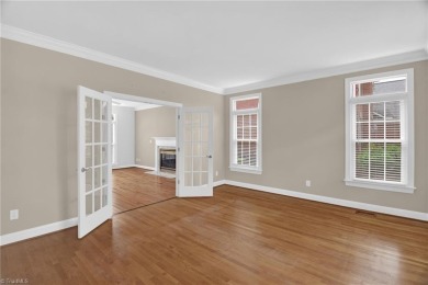 PRICE IMPROVEMENT to reflect cosmetic updates needed. GET INTO on Sedgefield Golf Course in North Carolina - for sale on GolfHomes.com, golf home, golf lot