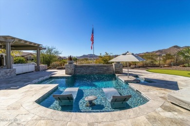 Discover unparalleled luxury in this David Weekley home, located on Verrado Golf Club - Victory in Arizona - for sale on GolfHomes.com, golf home, golf lot