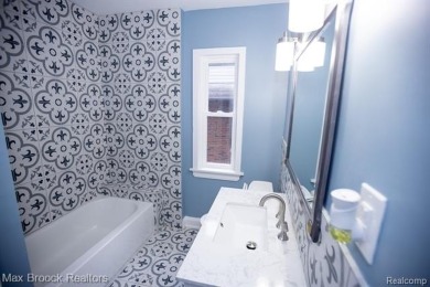 Beautifully renovated in 2025, this spacious home offers six on Detroit Golf Club  in Michigan - for sale on GolfHomes.com, golf home, golf lot