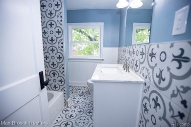 Beautifully renovated in 2025, this spacious home offers six on Detroit Golf Club  in Michigan - for sale on GolfHomes.com, golf home, golf lot