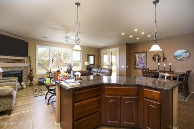 Sit on the north front patio and visit with friendly neighbors on Sunland Springs Golf Course  in Arizona - for sale on GolfHomes.com, golf home, golf lot