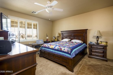 Sit on the north front patio and visit with friendly neighbors on Sunland Springs Golf Course  in Arizona - for sale on GolfHomes.com, golf home, golf lot