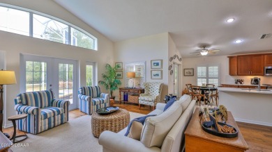 This beautifully updated 3-bedroom 2-bath pool home shows like on Plantation Bay Golf and Country Club in Florida - for sale on GolfHomes.com, golf home, golf lot