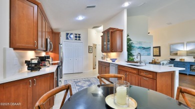 This beautifully updated 3-bedroom 2-bath pool home shows like on Plantation Bay Golf and Country Club in Florida - for sale on GolfHomes.com, golf home, golf lot