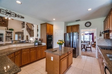 Nestled in a prestigious gated community, this stunning home on Ridgeview Ranch Golf Club in Texas - for sale on GolfHomes.com, golf home, golf lot