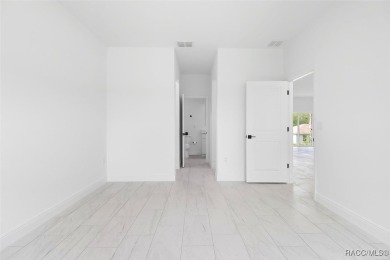 Come fall in love with this beautifully designed NEW on Citrus Springs Country Club in Florida - for sale on GolfHomes.com, golf home, golf lot