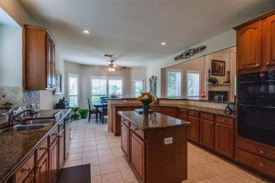 Nestled in a prestigious gated community, this stunning home on Ridgeview Ranch Golf Club in Texas - for sale on GolfHomes.com, golf home, golf lot