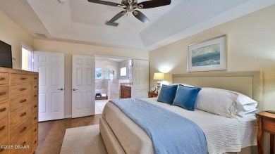 This beautifully updated 3-bedroom 2-bath pool home shows like on Plantation Bay Golf and Country Club in Florida - for sale on GolfHomes.com, golf home, golf lot