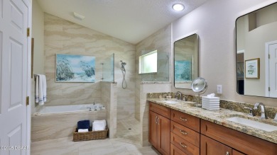 This beautifully updated 3-bedroom 2-bath pool home shows like on Plantation Bay Golf and Country Club in Florida - for sale on GolfHomes.com, golf home, golf lot