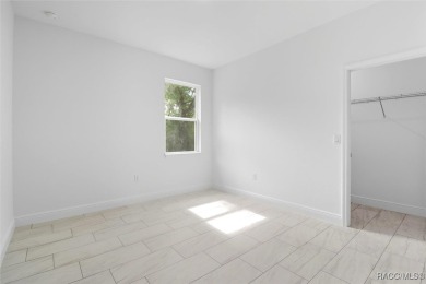 Come fall in love with this beautifully designed NEW on Citrus Springs Country Club in Florida - for sale on GolfHomes.com, golf home, golf lot