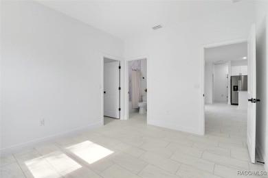 Come fall in love with this beautifully designed NEW on Citrus Springs Country Club in Florida - for sale on GolfHomes.com, golf home, golf lot