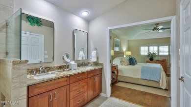 This beautifully updated 3-bedroom 2-bath pool home shows like on Plantation Bay Golf and Country Club in Florida - for sale on GolfHomes.com, golf home, golf lot