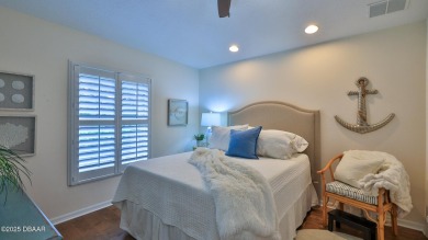 This beautifully updated 3-bedroom 2-bath pool home shows like on Plantation Bay Golf and Country Club in Florida - for sale on GolfHomes.com, golf home, golf lot