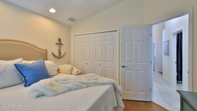 This beautifully updated 3-bedroom 2-bath pool home shows like on Plantation Bay Golf and Country Club in Florida - for sale on GolfHomes.com, golf home, golf lot