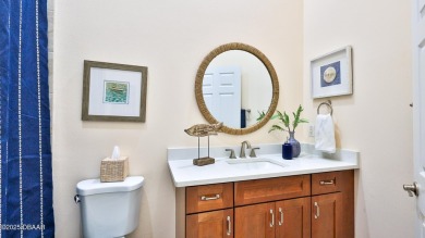 This beautifully updated 3-bedroom 2-bath pool home shows like on Plantation Bay Golf and Country Club in Florida - for sale on GolfHomes.com, golf home, golf lot