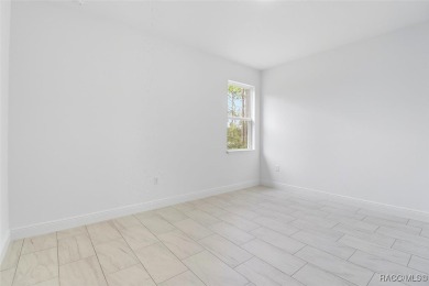 Come fall in love with this beautifully designed NEW on Citrus Springs Country Club in Florida - for sale on GolfHomes.com, golf home, golf lot