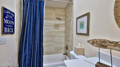 This beautifully updated 3-bedroom 2-bath pool home shows like on Plantation Bay Golf and Country Club in Florida - for sale on GolfHomes.com, golf home, golf lot