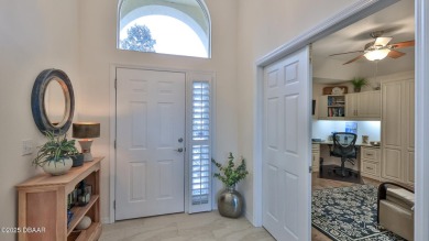 This beautifully updated 3-bedroom 2-bath pool home shows like on Plantation Bay Golf and Country Club in Florida - for sale on GolfHomes.com, golf home, golf lot
