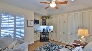 This beautifully updated 3-bedroom 2-bath pool home shows like on Plantation Bay Golf and Country Club in Florida - for sale on GolfHomes.com, golf home, golf lot