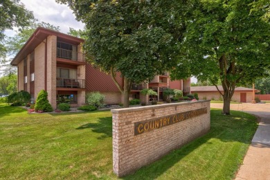 This top floor condo is located next to The Saginaw Country Club on Saginaw Country Club in Michigan - for sale on GolfHomes.com, golf home, golf lot