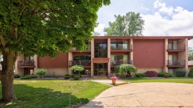 This top floor condo is located next to The Saginaw Country Club on Saginaw Country Club in Michigan - for sale on GolfHomes.com, golf home, golf lot