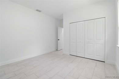 Come fall in love with this beautifully designed NEW on Citrus Springs Country Club in Florida - for sale on GolfHomes.com, golf home, golf lot