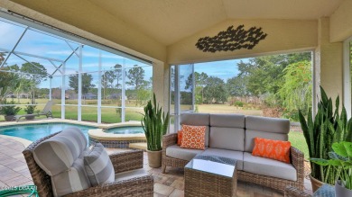 This beautifully updated 3-bedroom 2-bath pool home shows like on Plantation Bay Golf and Country Club in Florida - for sale on GolfHomes.com, golf home, golf lot