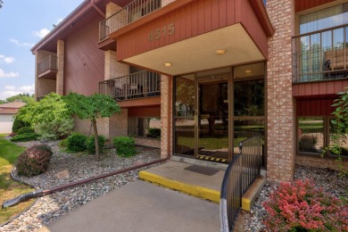 This top floor condo is located next to The Saginaw Country Club on Saginaw Country Club in Michigan - for sale on GolfHomes.com, golf home, golf lot
