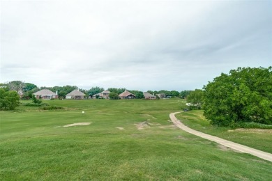 Nestled in a prestigious gated community, this stunning home on Ridgeview Ranch Golf Club in Texas - for sale on GolfHomes.com, golf home, golf lot