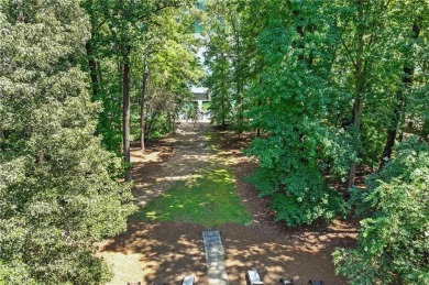 Listed below the current appraisal, this isnt just another house on Lanier Island Legacy Golf Couorse in Georgia - for sale on GolfHomes.com, golf home, golf lot