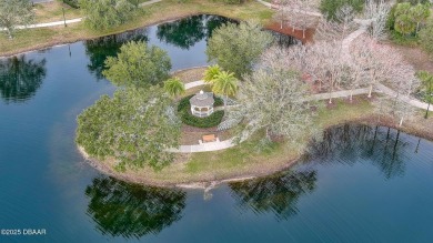 This beautifully updated 3-bedroom 2-bath pool home shows like on Plantation Bay Golf and Country Club in Florida - for sale on GolfHomes.com, golf home, golf lot