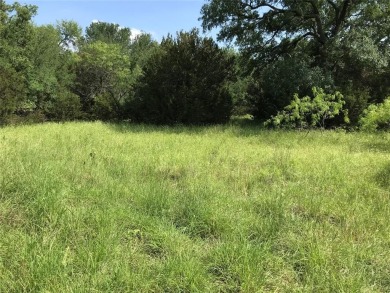 Nearly 1 AC sitting across from the Old Course Driving Range and on White Bluff Resort - Old Course in Texas - for sale on GolfHomes.com, golf home, golf lot