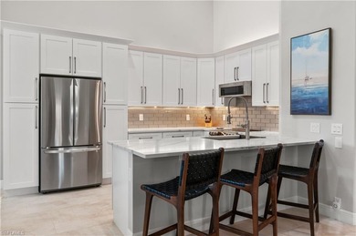 Impeccably Updated Carriage Home with Sweeping Lake Views - on Worthington Country Club in Florida - for sale on GolfHomes.com, golf home, golf lot