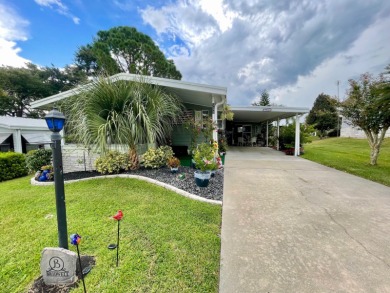 Located on a quiet street with a view of the Golf Course and on Water Oak Country Club Estates in Florida - for sale on GolfHomes.com, golf home, golf lot