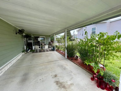 Located on a quiet street with a view of the Golf Course and on Water Oak Country Club Estates in Florida - for sale on GolfHomes.com, golf home, golf lot