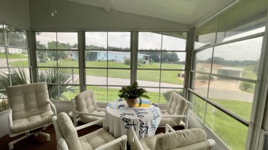 Located on a quiet street with a view of the Golf Course and on Water Oak Country Club Estates in Florida - for sale on GolfHomes.com, golf home, golf lot