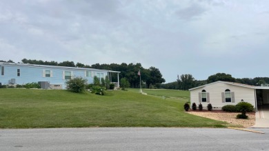 Located on a quiet street with a view of the Golf Course and on Water Oak Country Club Estates in Florida - for sale on GolfHomes.com, golf home, golf lot