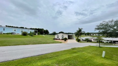 Located on a quiet street with a view of the Golf Course and on Water Oak Country Club Estates in Florida - for sale on GolfHomes.com, golf home, golf lot
