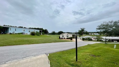 Located on a quiet street with a view of the Golf Course and on Water Oak Country Club Estates in Florida - for sale on GolfHomes.com, golf home, golf lot