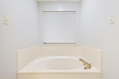 Welcome to this inviting 3-bedroom, 2-bathroom home nestled in on The Lake Country Club - Lake Waco in Texas - for sale on GolfHomes.com, golf home, golf lot