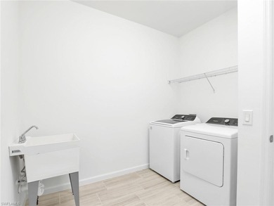 Step into a nearly new 5 bedroom, 4 bathroom home in the highly on Old Corkscrew Golf Club in Florida - for sale on GolfHomes.com, golf home, golf lot