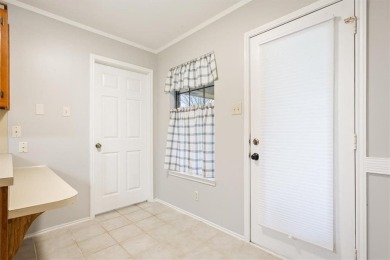 Welcome to this inviting 3-bedroom, 2-bathroom home nestled in on The Lake Country Club - Lake Waco in Texas - for sale on GolfHomes.com, golf home, golf lot