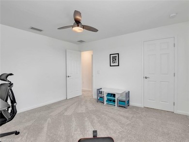 Step into a nearly new 5 bedroom, 4 bathroom home in the highly on Old Corkscrew Golf Club in Florida - for sale on GolfHomes.com, golf home, golf lot