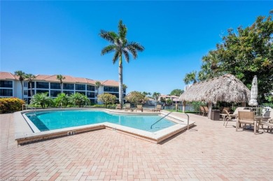 Impressive updates, serene setting, unbeatable location in on Club at Pelican Bay Golf Course in Florida - for sale on GolfHomes.com, golf home, golf lot