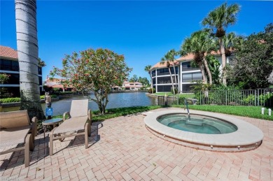 Impressive updates, serene setting, unbeatable location in on Club at Pelican Bay Golf Course in Florida - for sale on GolfHomes.com, golf home, golf lot