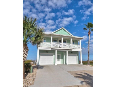 Gorgeous home provides the perfect coastal retreat as an on Palmilla Beach Golf Club in Texas - for sale on GolfHomes.com, golf home, golf lot