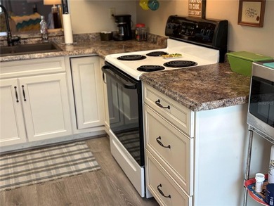 Come visit this Two Bedroom/Two Bath desirable Seven Springs on Seven Springs Golf and Country Club in Florida - for sale on GolfHomes.com, golf home, golf lot