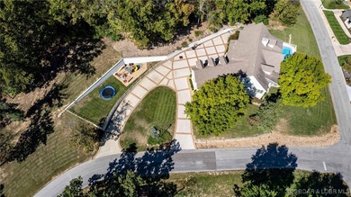 LOOKING FOR CONVENIENT LOCATION, PRIVACY, AND RESORT-STYLE on Osage National Golf Club in Missouri - for sale on GolfHomes.com, golf home, golf lot
