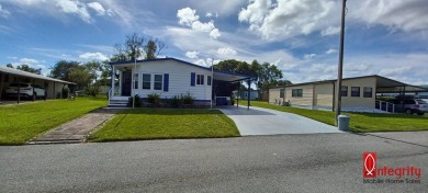 Come settle down and relax in a beautiful manufactured home with on Fairways Country Club in Florida - for sale on GolfHomes.com, golf home, golf lot